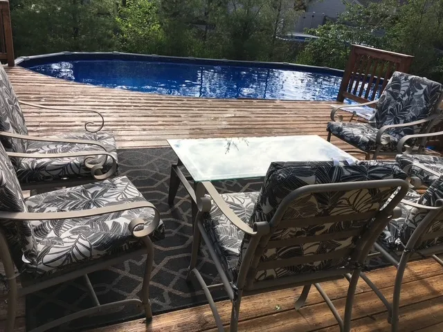 a view of balcony with wooden floor