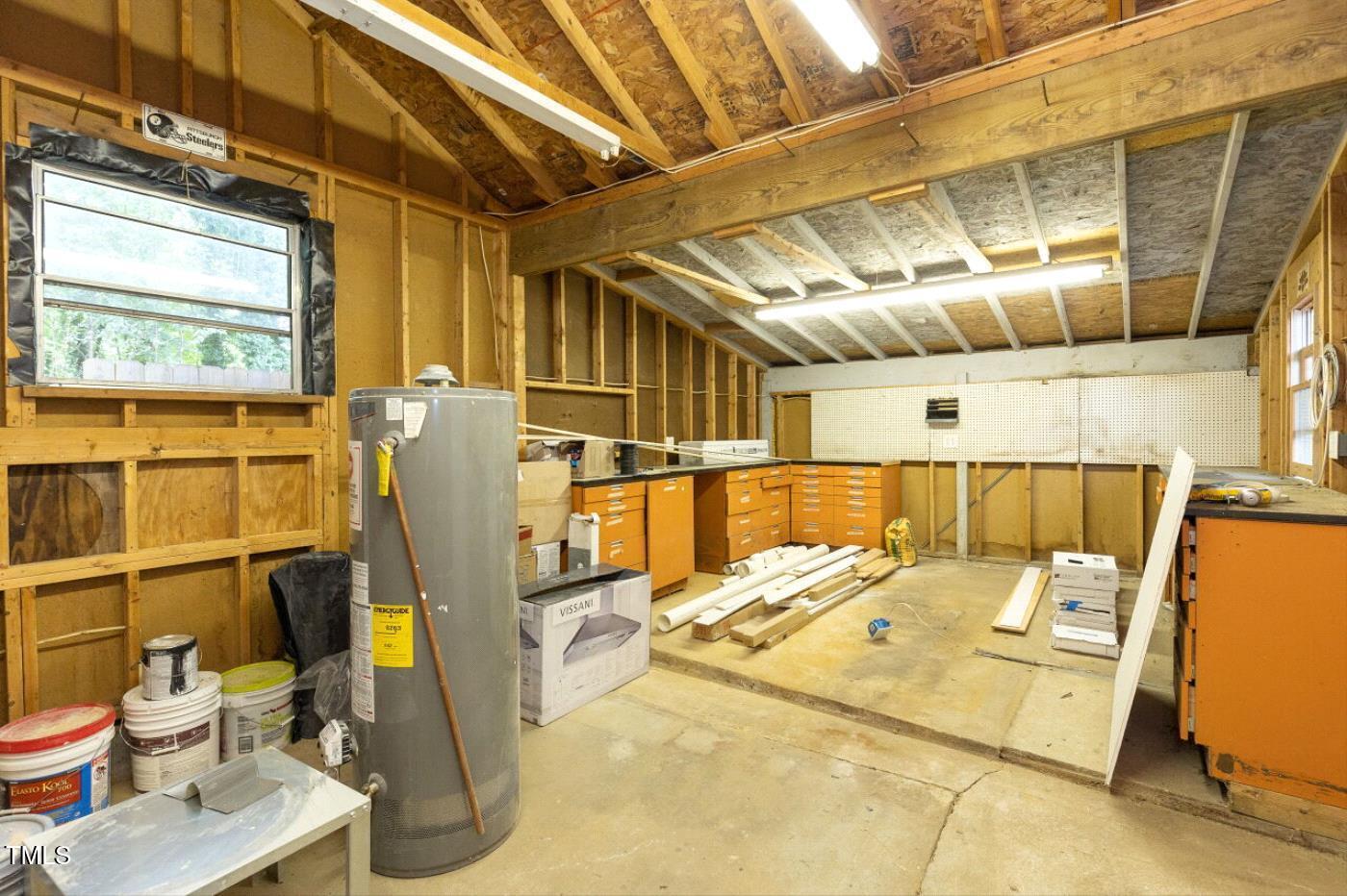 410 Fenton Street Raleigh, NC 27604 - Photo 25 of 28 a bed room with a bed
