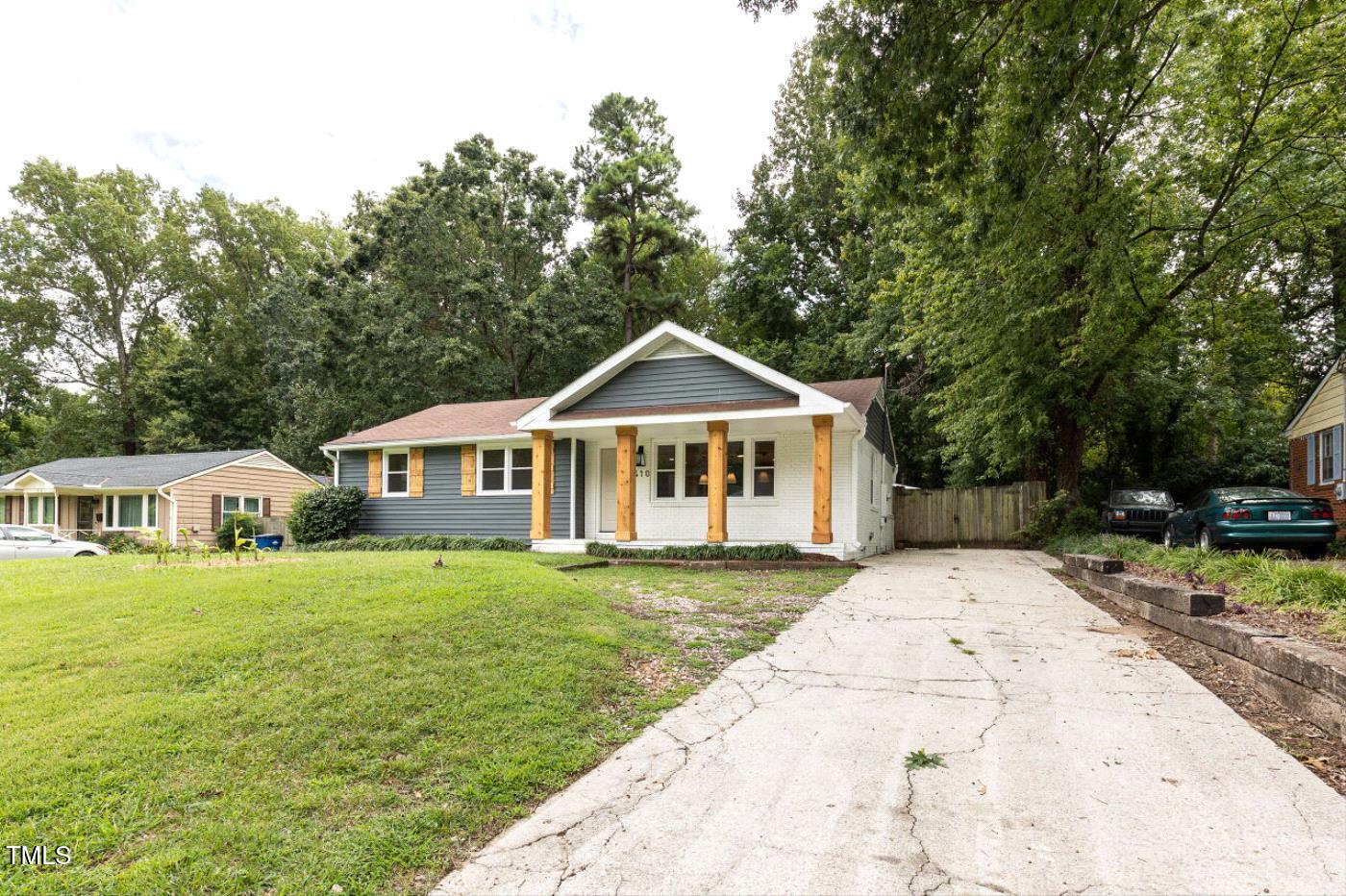 410 Fenton Street Raleigh, NC 27604 - Photo 3 of 28 a front view of a house with garden