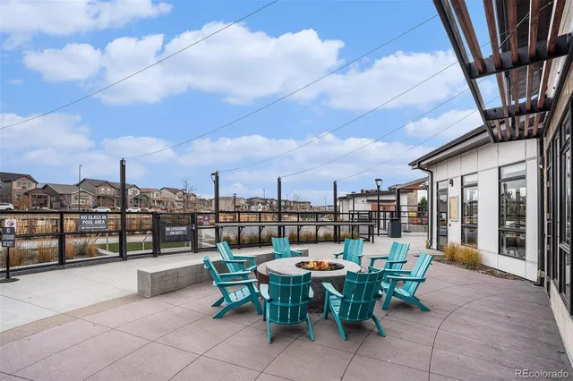 a view of a terrace with furniture