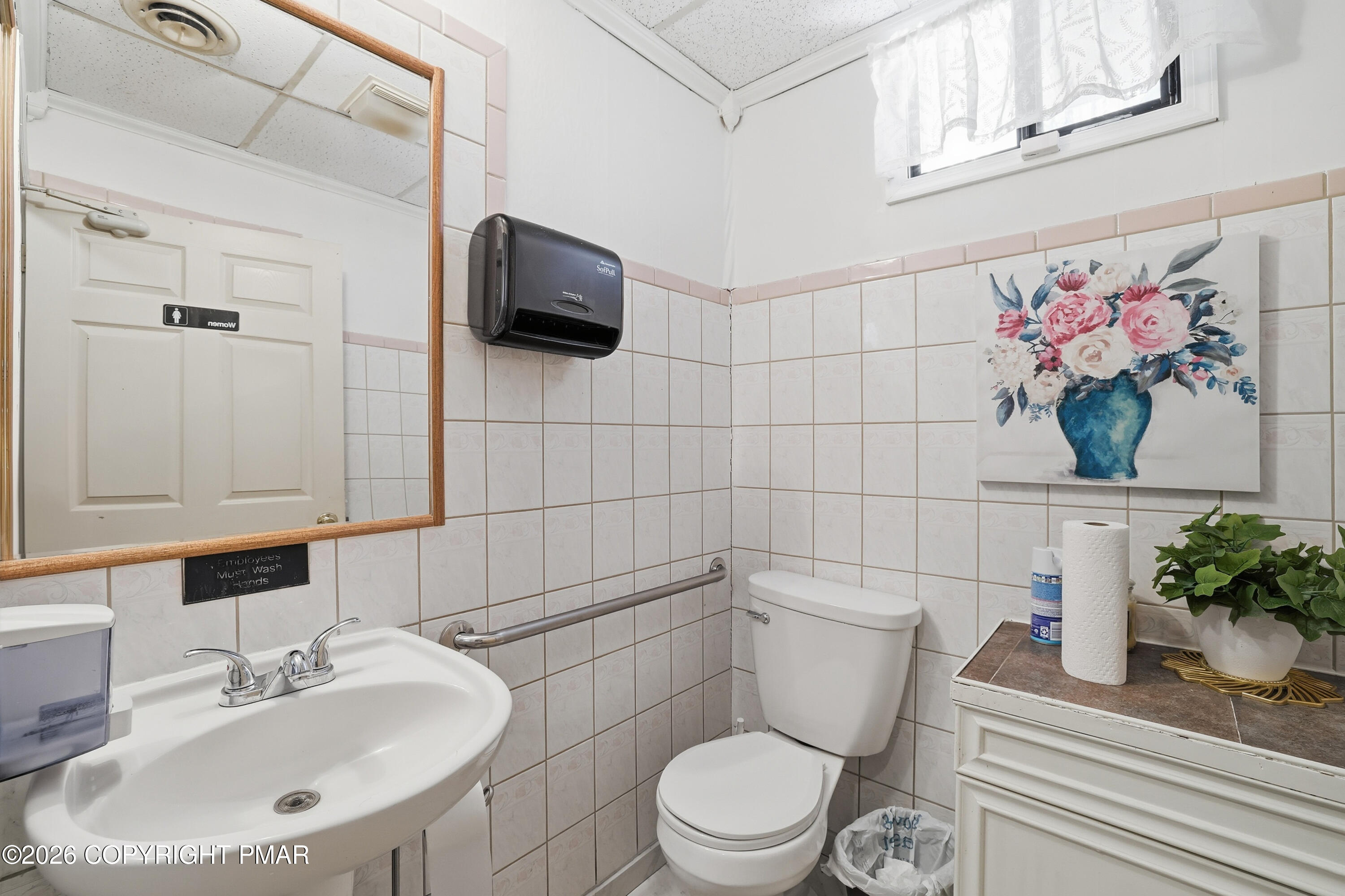 361 Interchange Road Kresgeville, PA 18333 - Photo 22 of 48 a bathroom with a toilet sink and mirror