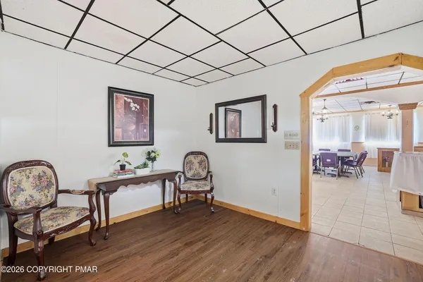 a kitchen with appliances cabinets and a table
