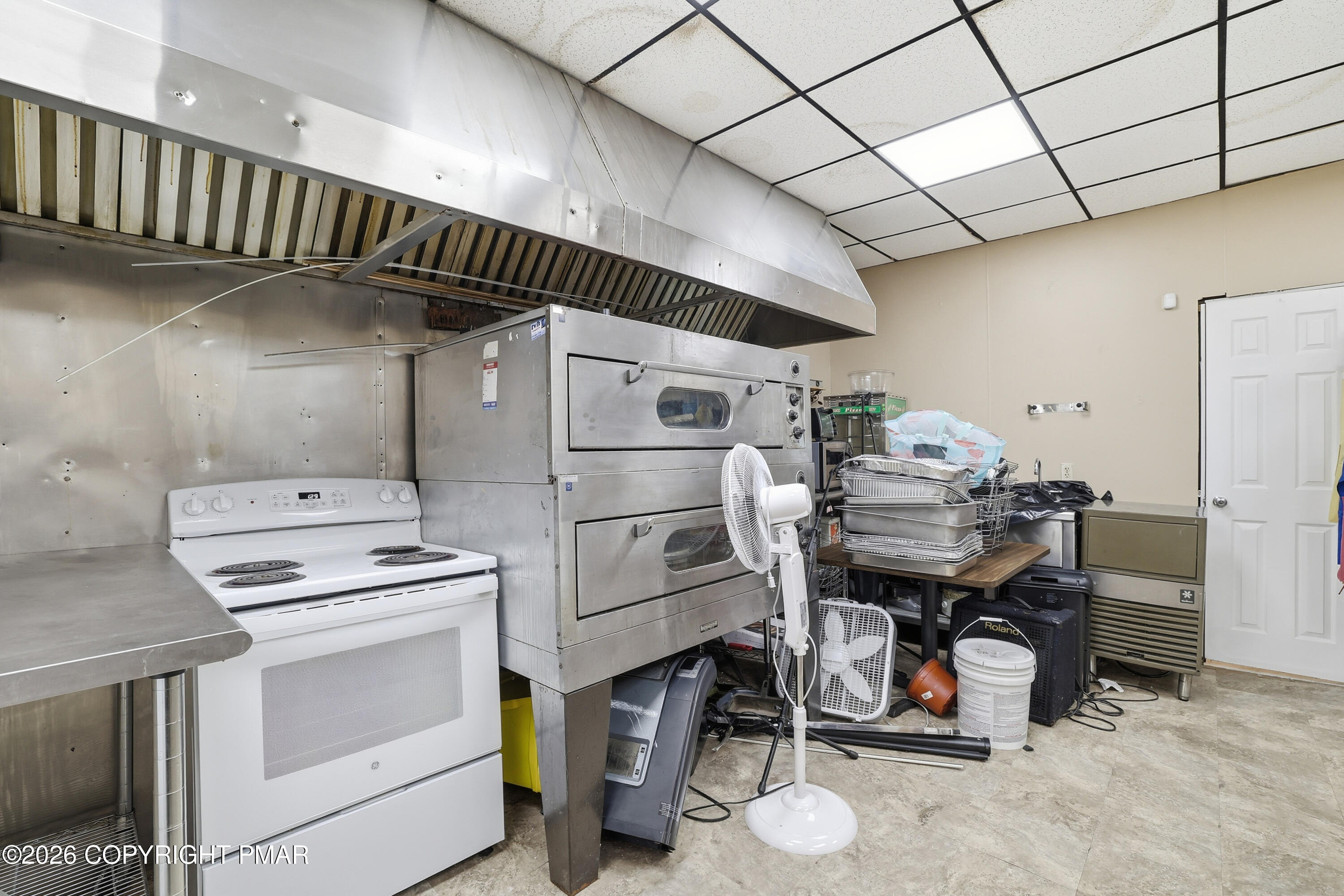 361 Interchange Road Kresgeville, PA 18333 - Photo 25 of 48 a kitchen with appliances cabinets and a table