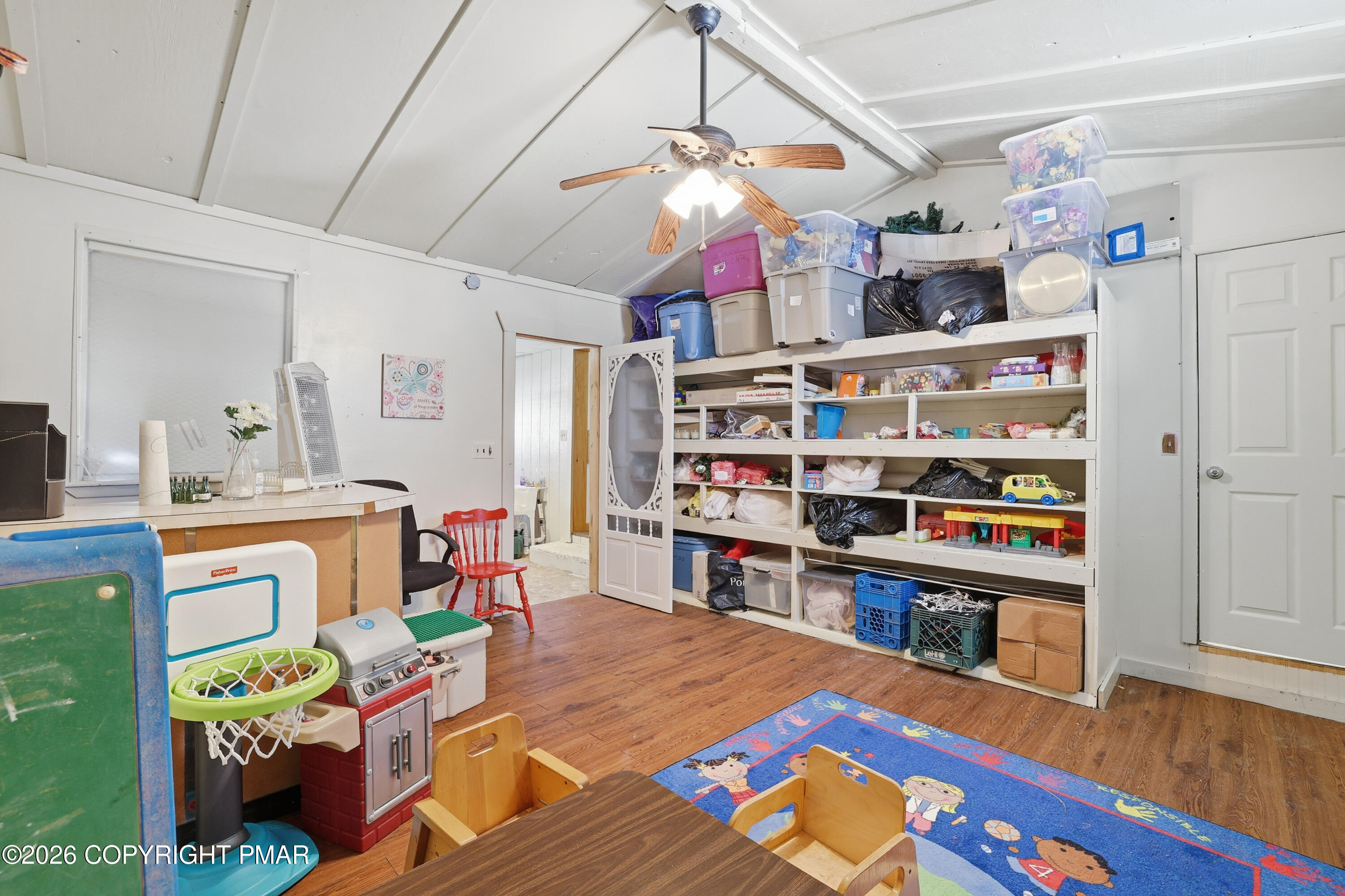 361 Interchange Road Kresgeville, PA 18333 - Photo 29 of 48 a room with furniture and a book shelf