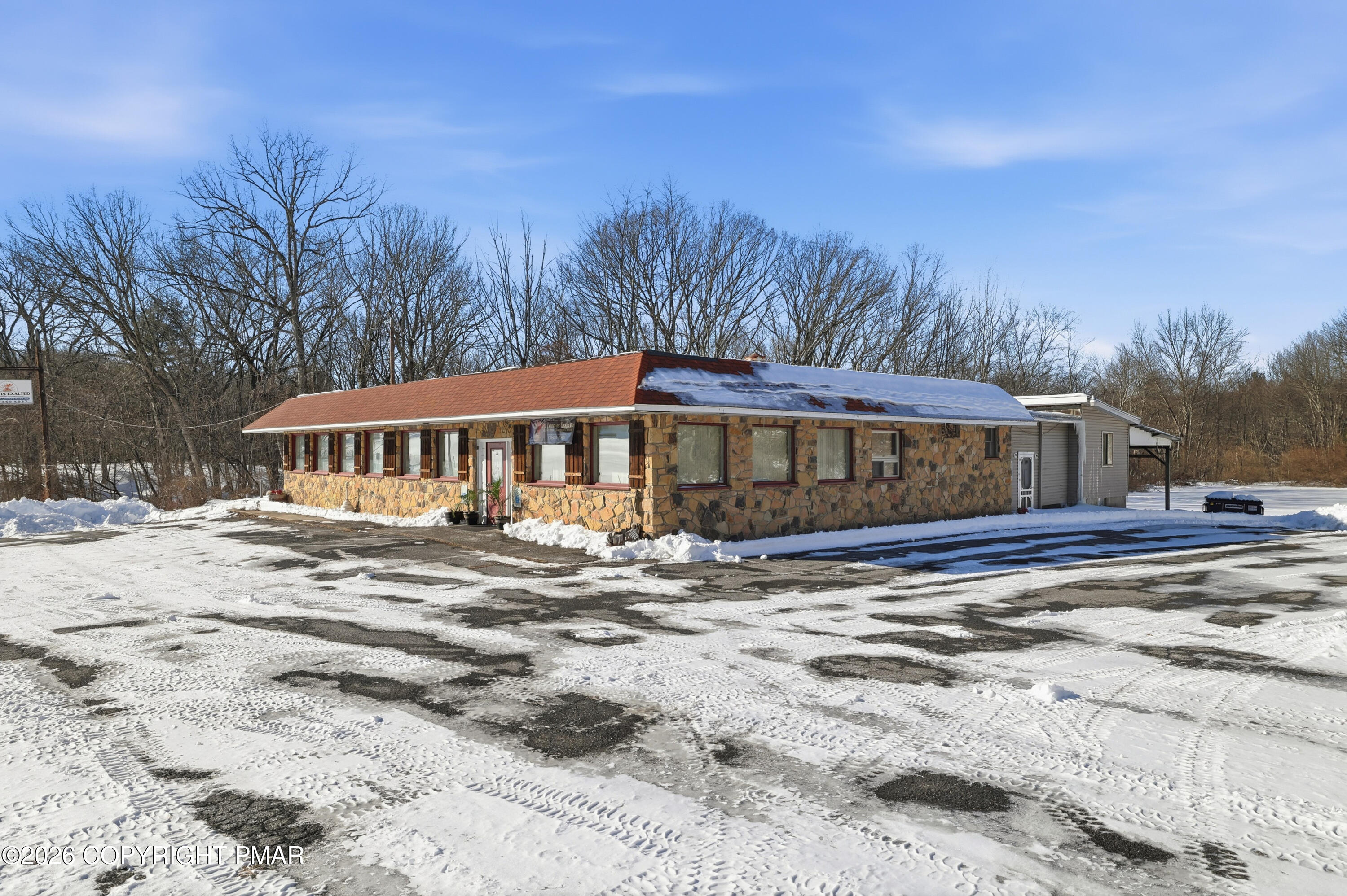 361 Interchange Road Kresgeville, PA 18333 - Photo 33 of 48 a view of a house with a yard covered in snow