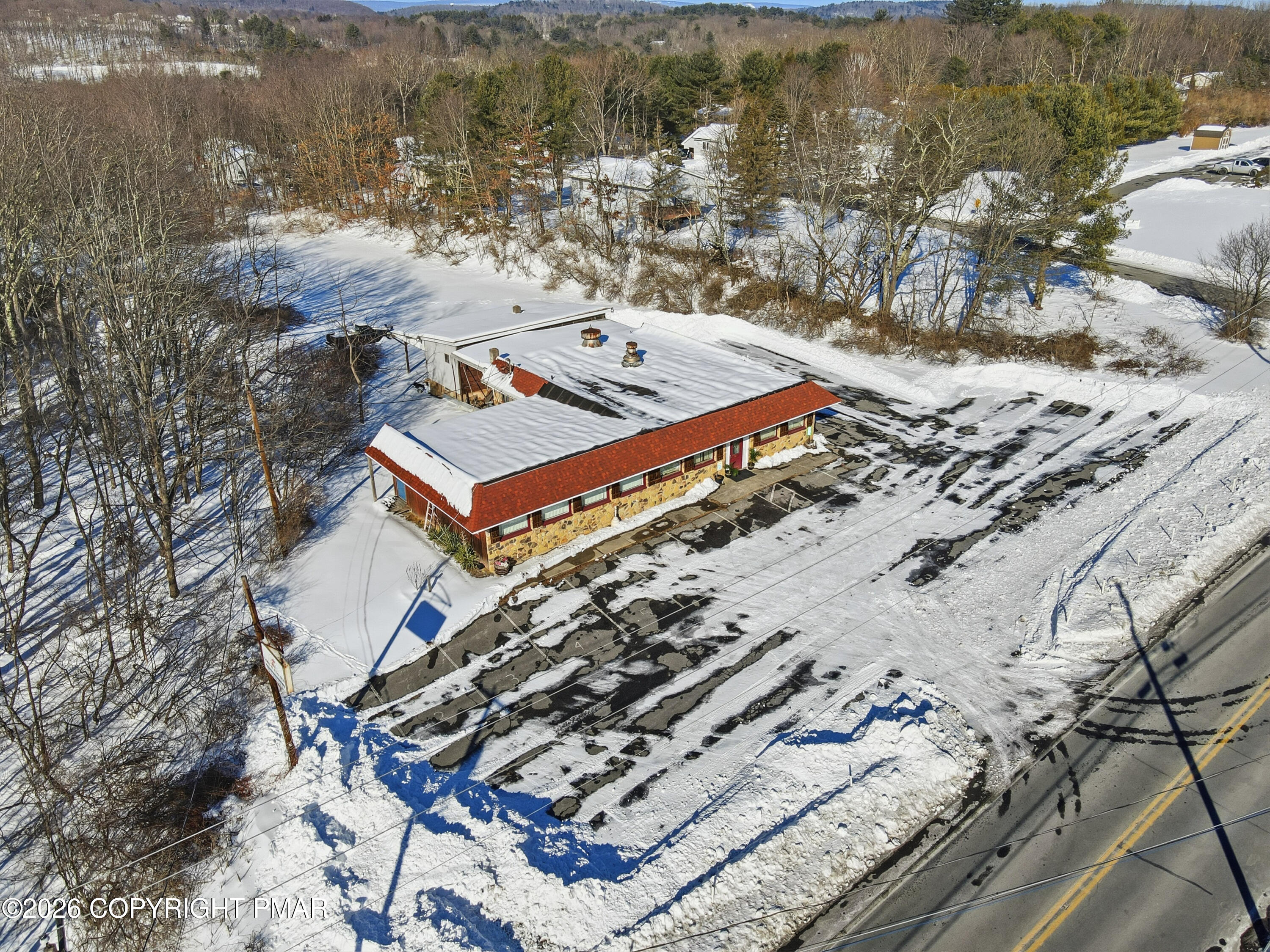 361 Interchange Road Kresgeville, PA 18333 - Photo 44 of 48 a view of a lake with a mountain