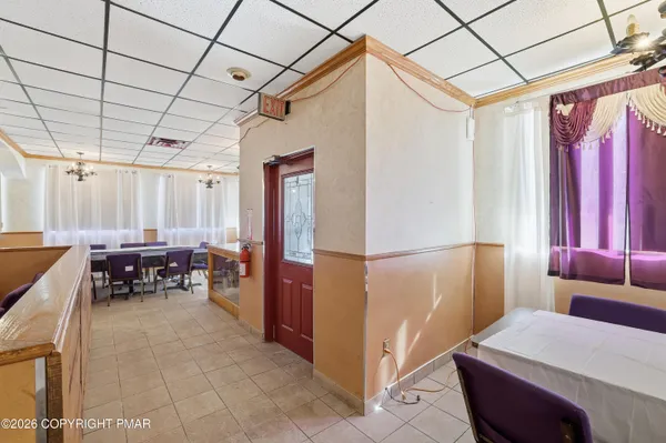 a view of a dining room with furniture