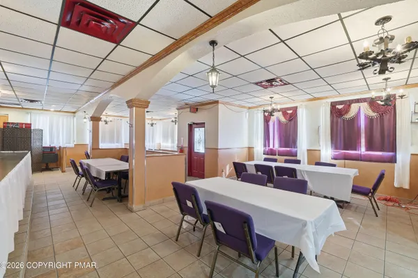 a view of a dining room with furniture