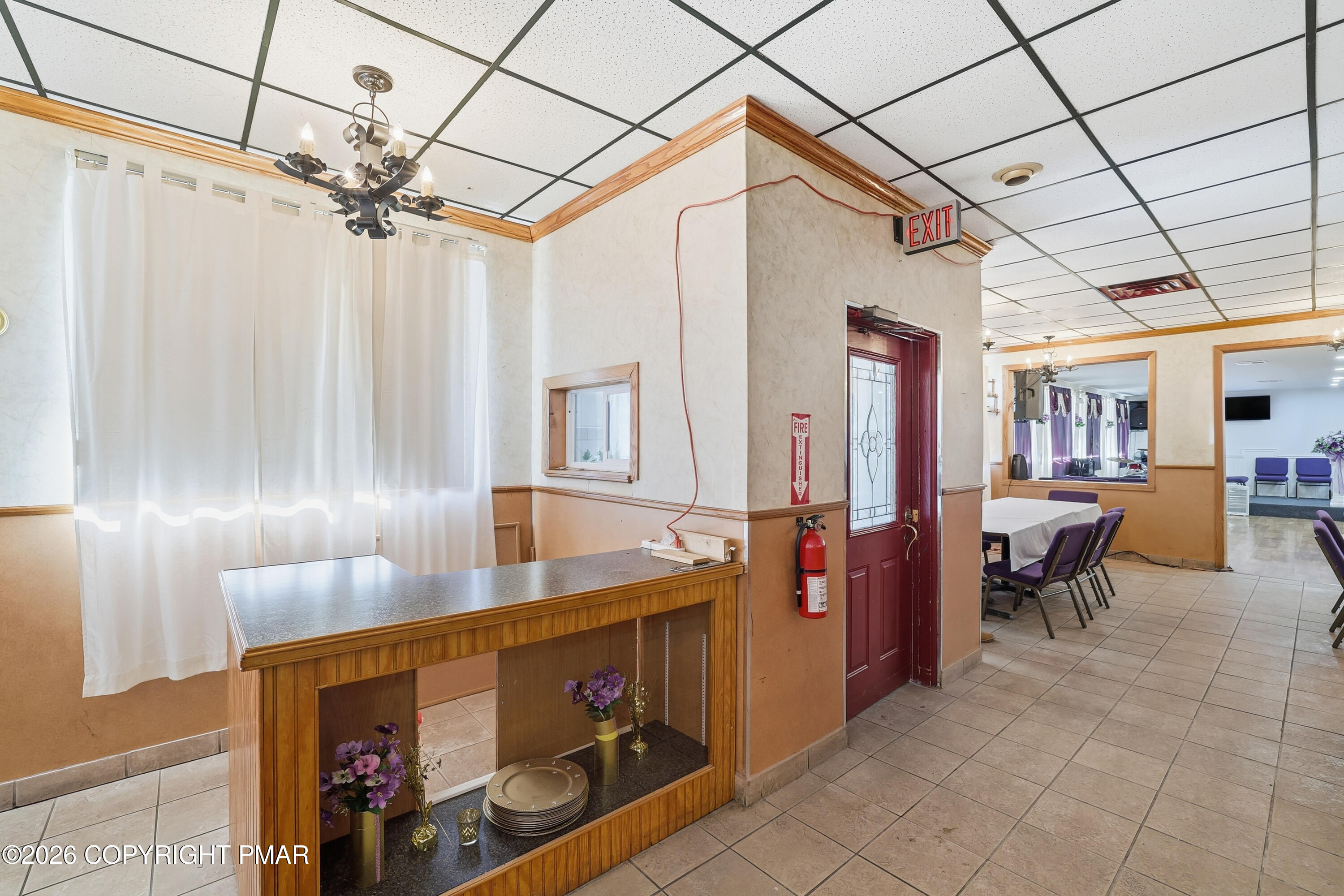 361 Interchange Road Kresgeville, PA 18333 - Photo 9 of 48 a view of a dining room with furniture and a chandelier