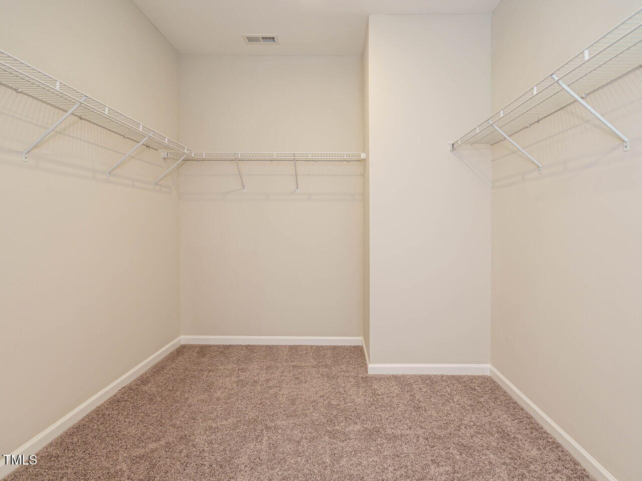 6333 Grace Lily Drive Raleigh, NC 27607 - Photo 18 of 26 a view of a room with racks on the wall