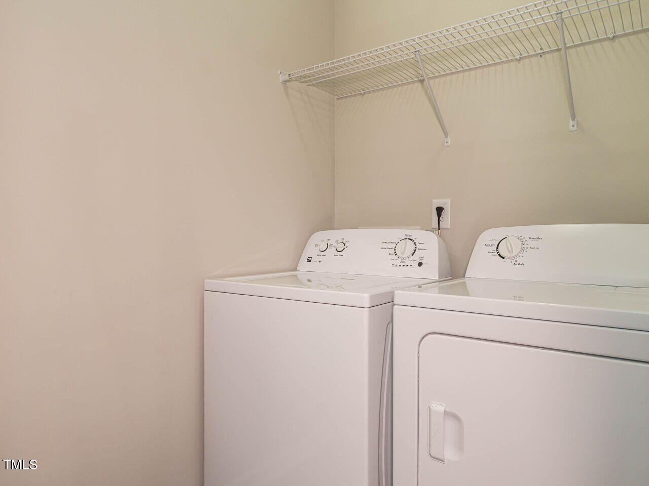 6333 Grace Lily Drive Raleigh, NC 27607 - Photo 19 of 26 a utility room with dryer and washer