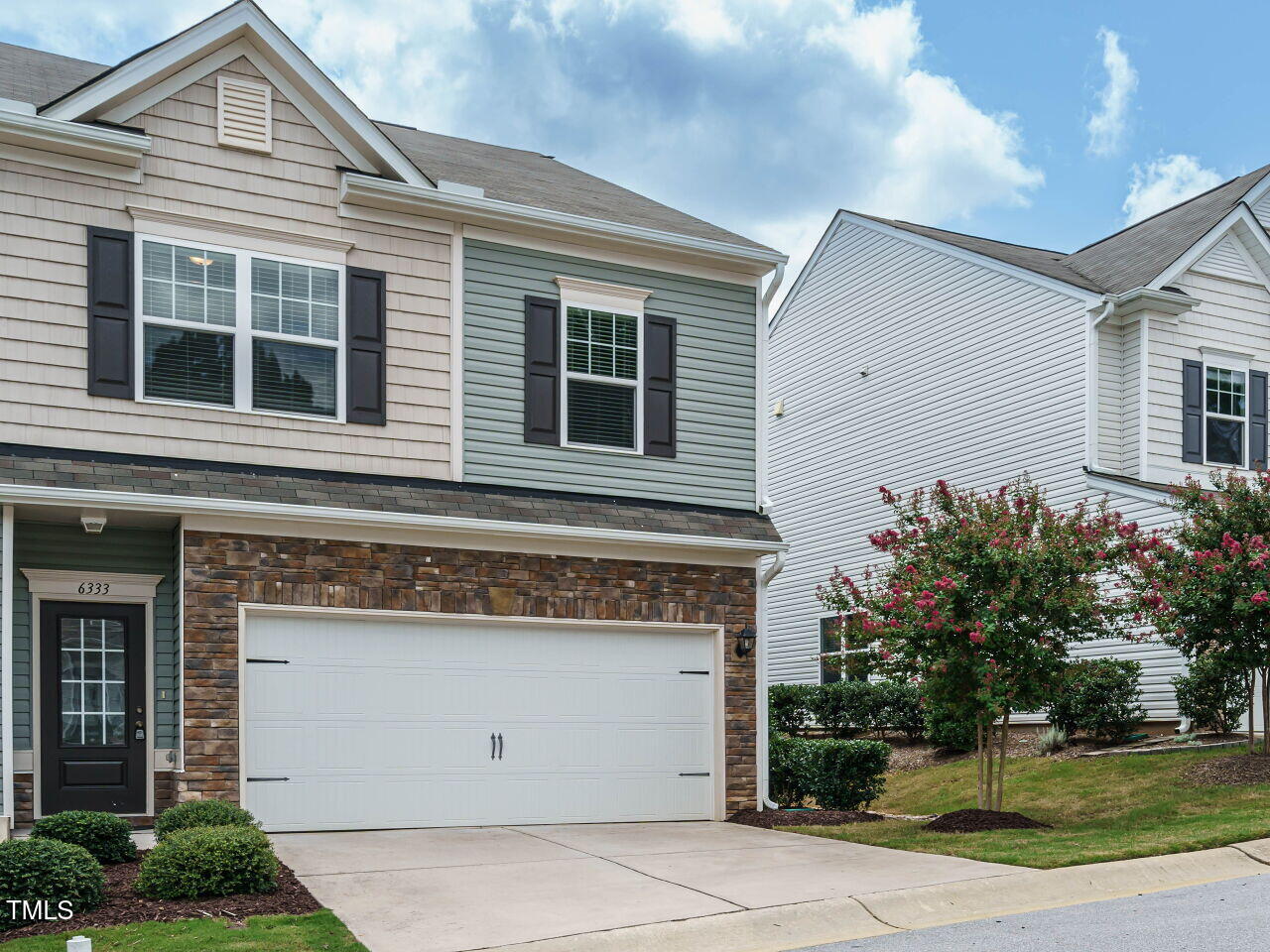 6333 Grace Lily Drive Raleigh, NC 27607 - Photo 2 of 26 a view of building with yard