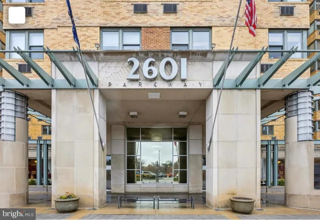 a view of a building with a street