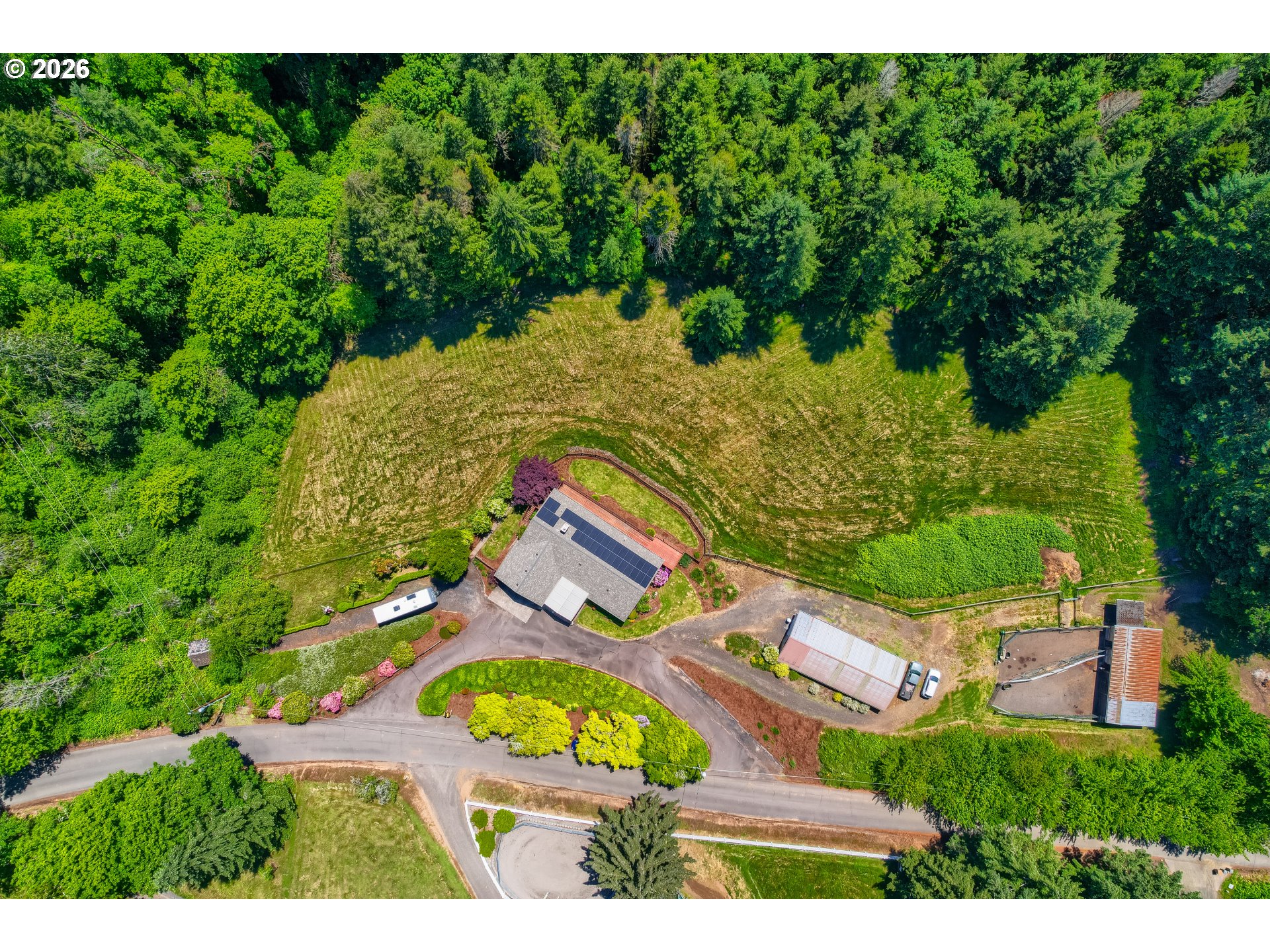 45354 Northwest Hartwick Road Banks, OR 97106 - Photo 28 of 35 an aerial view of residential house with outdoor space and trees all around