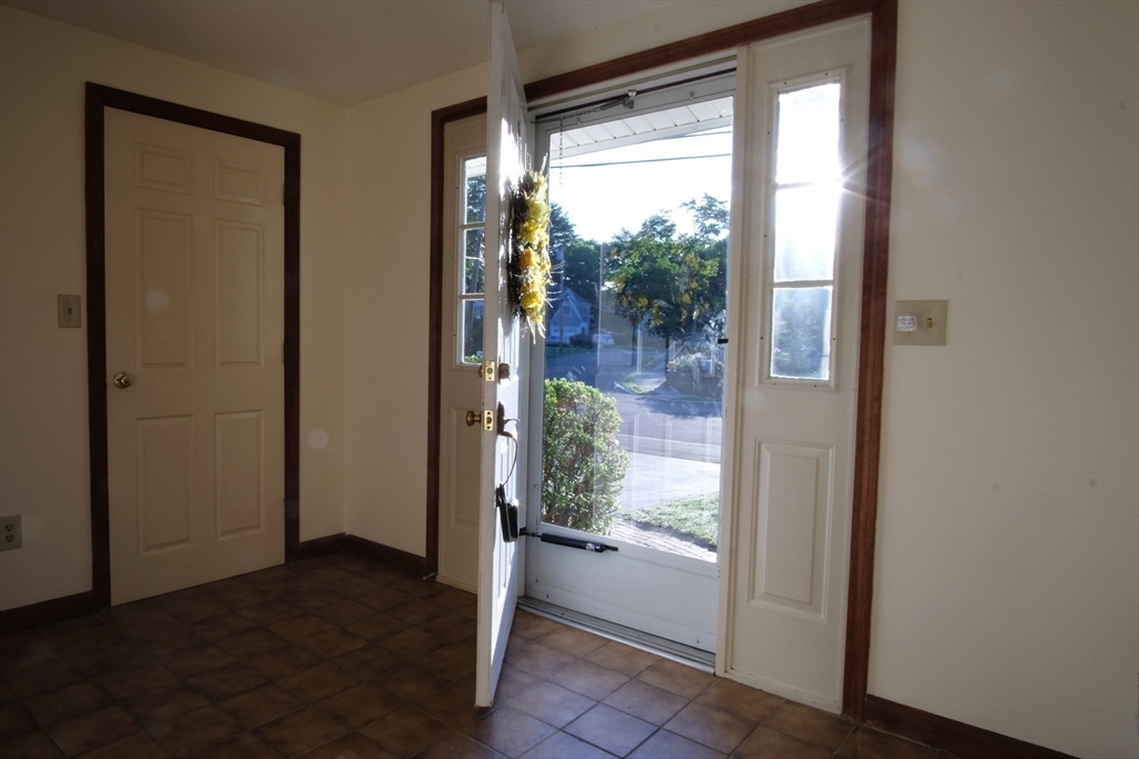 16 Arlington Road Natick, MA 01760 - Photo 24 of 34 a view of a glass door and a porch