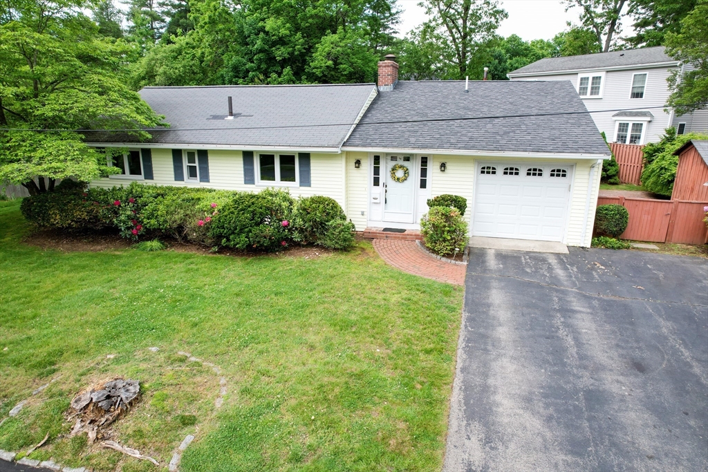 16 Arlington Road Natick, MA 01760 - Photo 32 of 34 a aerial view of a house with yard and plants