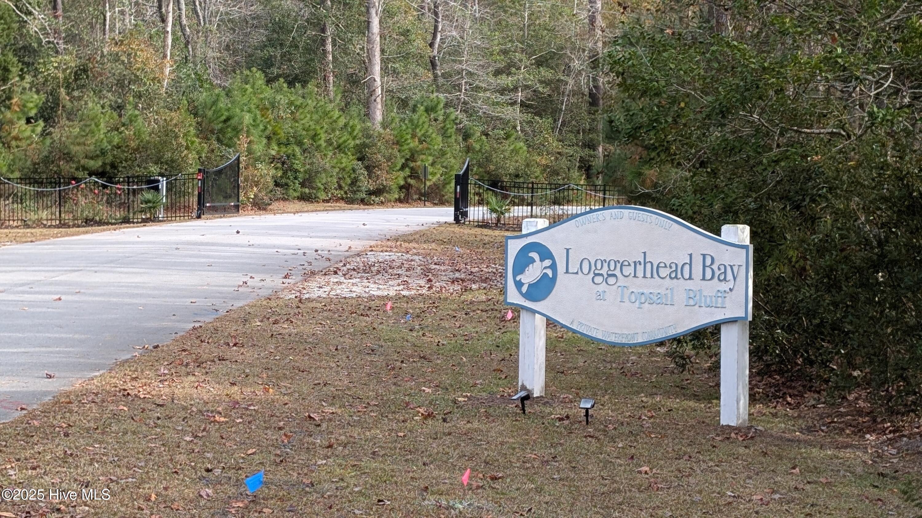 314 Livingston Court Holly Ridge, NC 28445 - Photo 2 of 10 SIgn and Main Gate Entrance