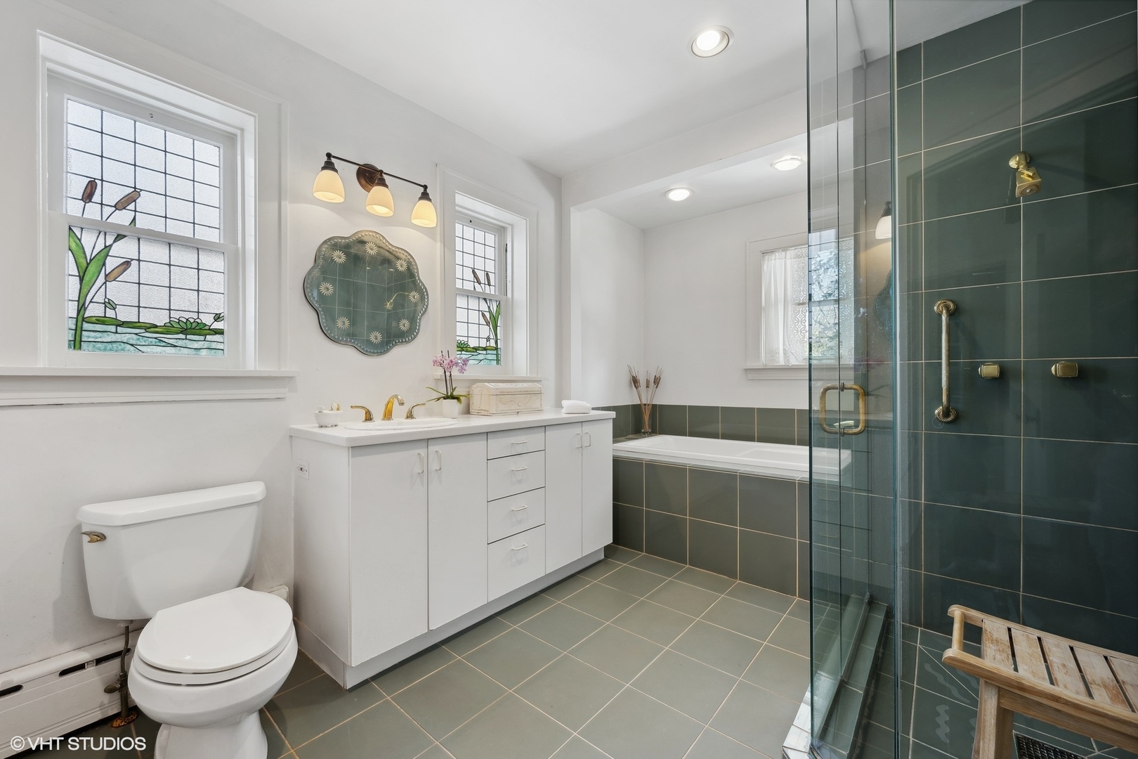 379 Ridge Avenue Winnetka, IL 60093 - Photo 18 of 31 a bathroom with a sink toilet and shower