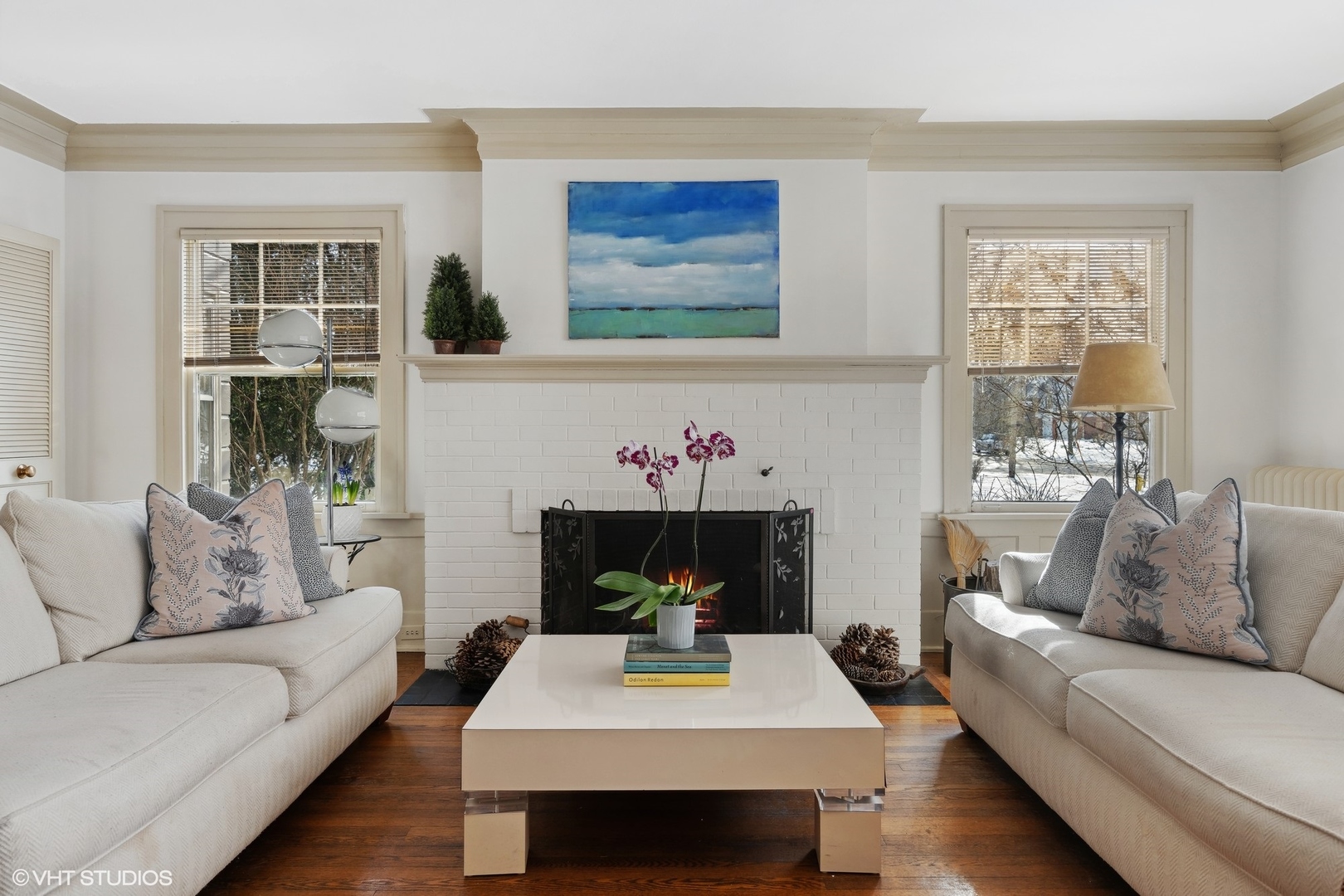 379 Ridge Avenue Winnetka, IL 60093 - Photo 3 of 31 a living room with furniture and a fireplace