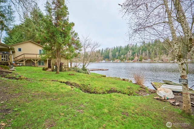 a backyard of a house with lots of green space