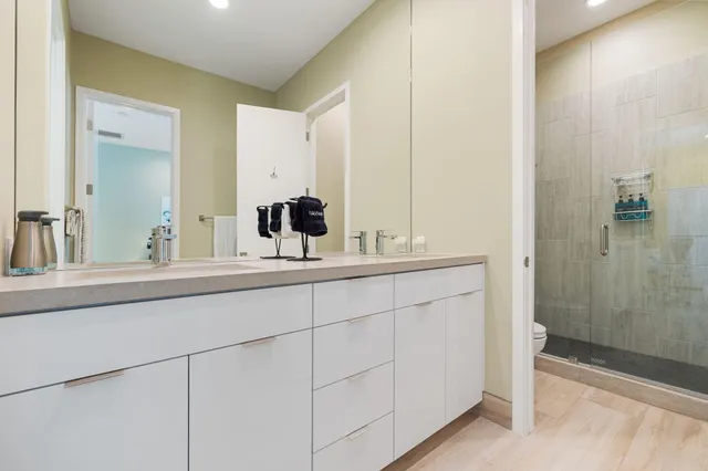 a bedroom with a bed and a painting