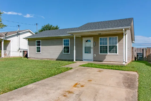a view of a house with a garden