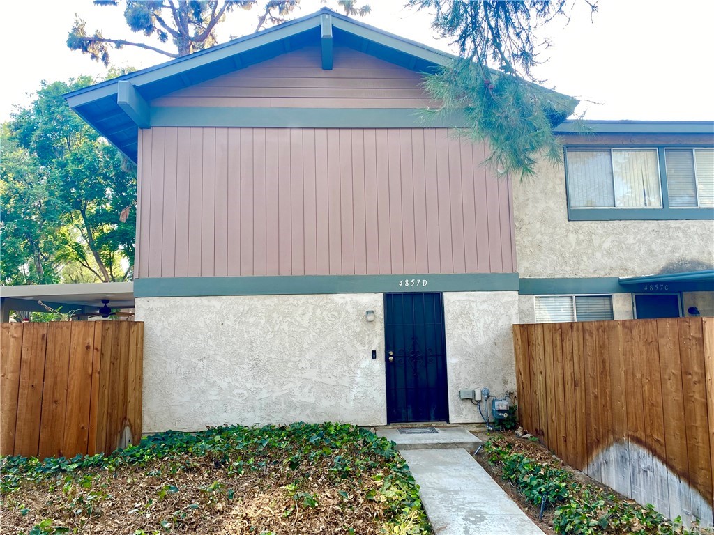 4857 Jackson Street, Unit D Riverside, CA 92503 - Photo 1 of 1 a small barn with a wooden fence