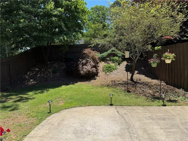 a view of backyard with green space
