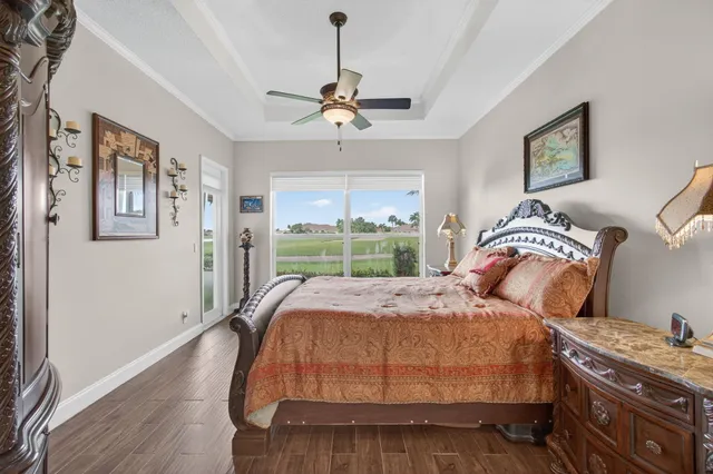 an aerial view of a residential houses with outdoor space and street view