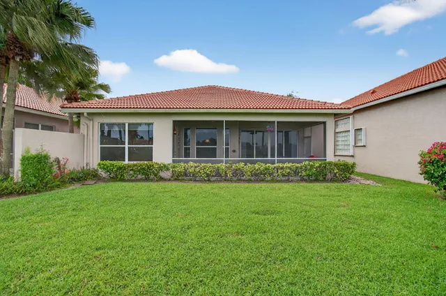 a view of a golf course with a lake