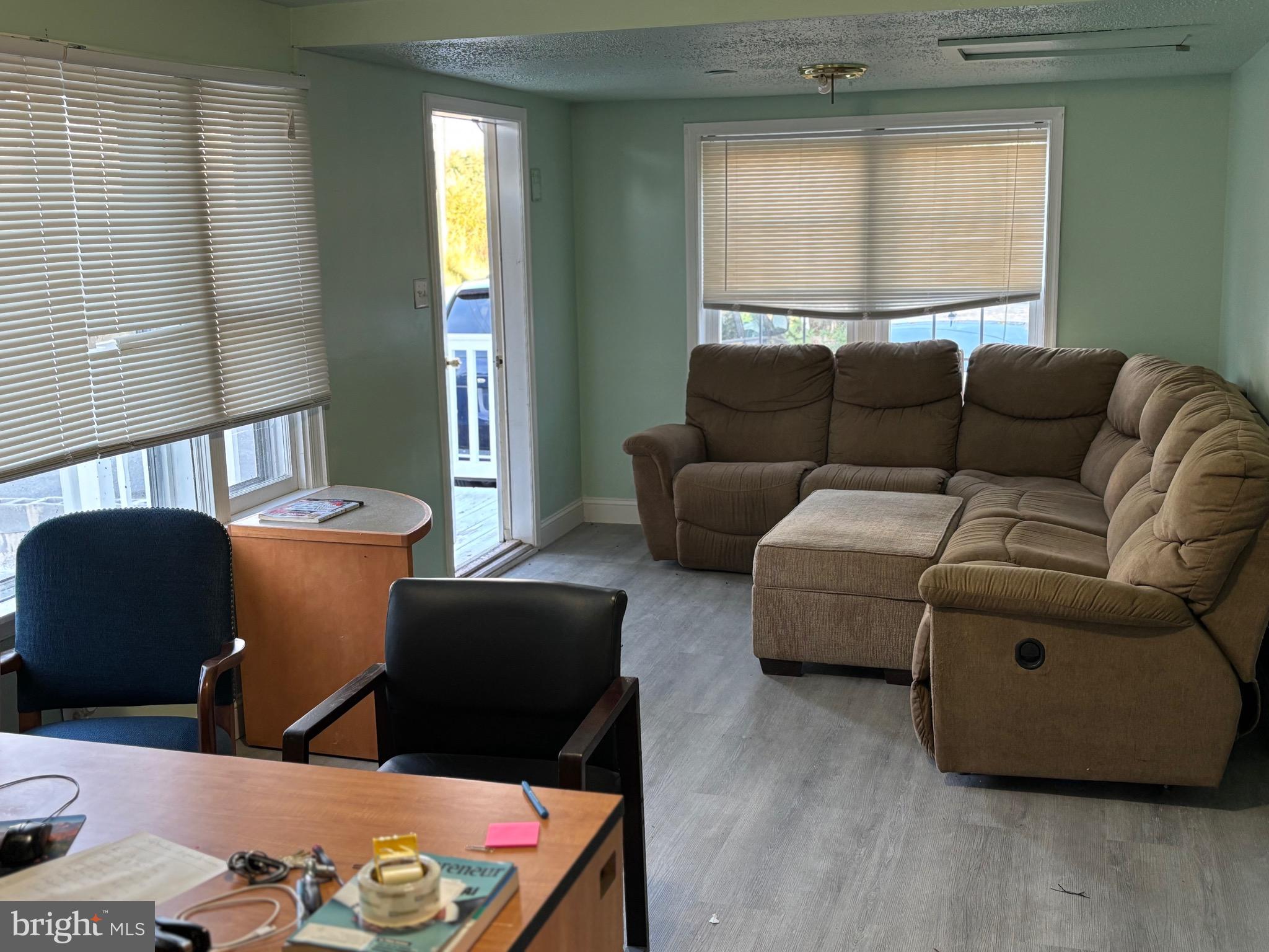 5312 Tabler Station Road Inwood, WV 25428 - Photo 24 of 37 a living room with furniture and a window