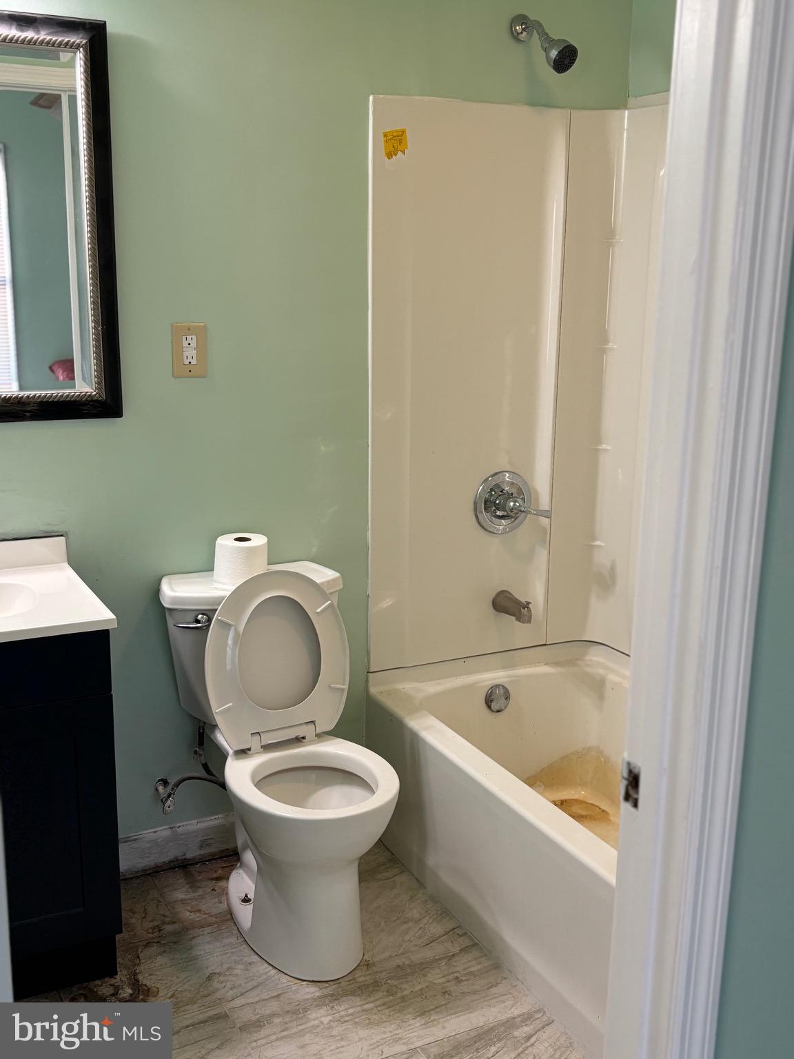 5312 Tabler Station Road Inwood, WV 25428 - Photo 27 of 37 a white toilet sitting next to a bathroom sink