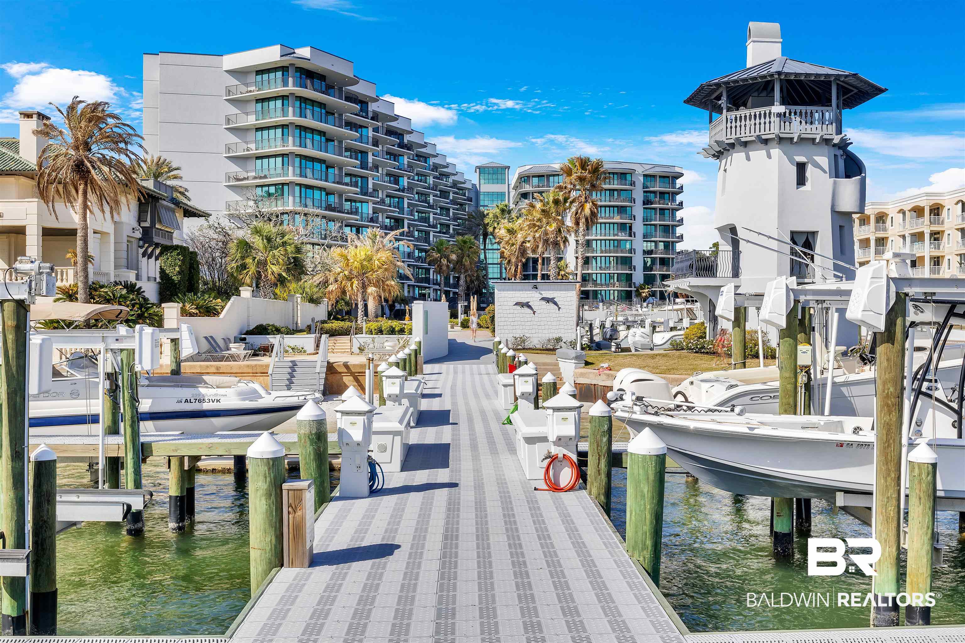 27582 Canal Road, Unit 2605 Orange Beach, AL 36561 - Photo 2 of 41 Dock featuring boat lift and a water view