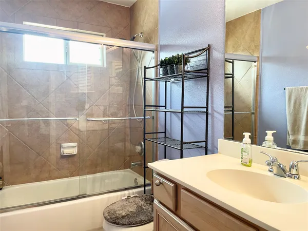 a bathroom with a sink and a bathtub