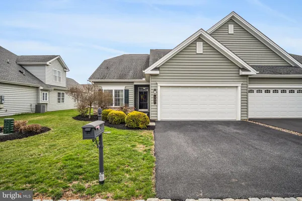 a view of a backyard with garden