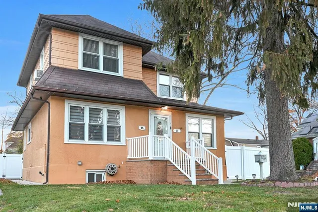 a front view of house with yard