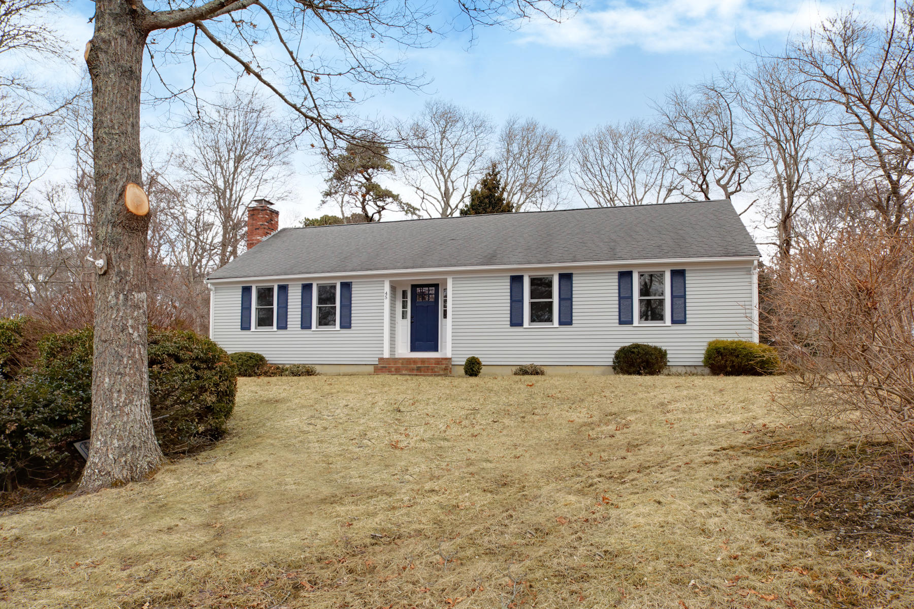 45 Chipman Road Sandwich, MA 02563 - Photo 30 of 30 a front view of a house with a yard