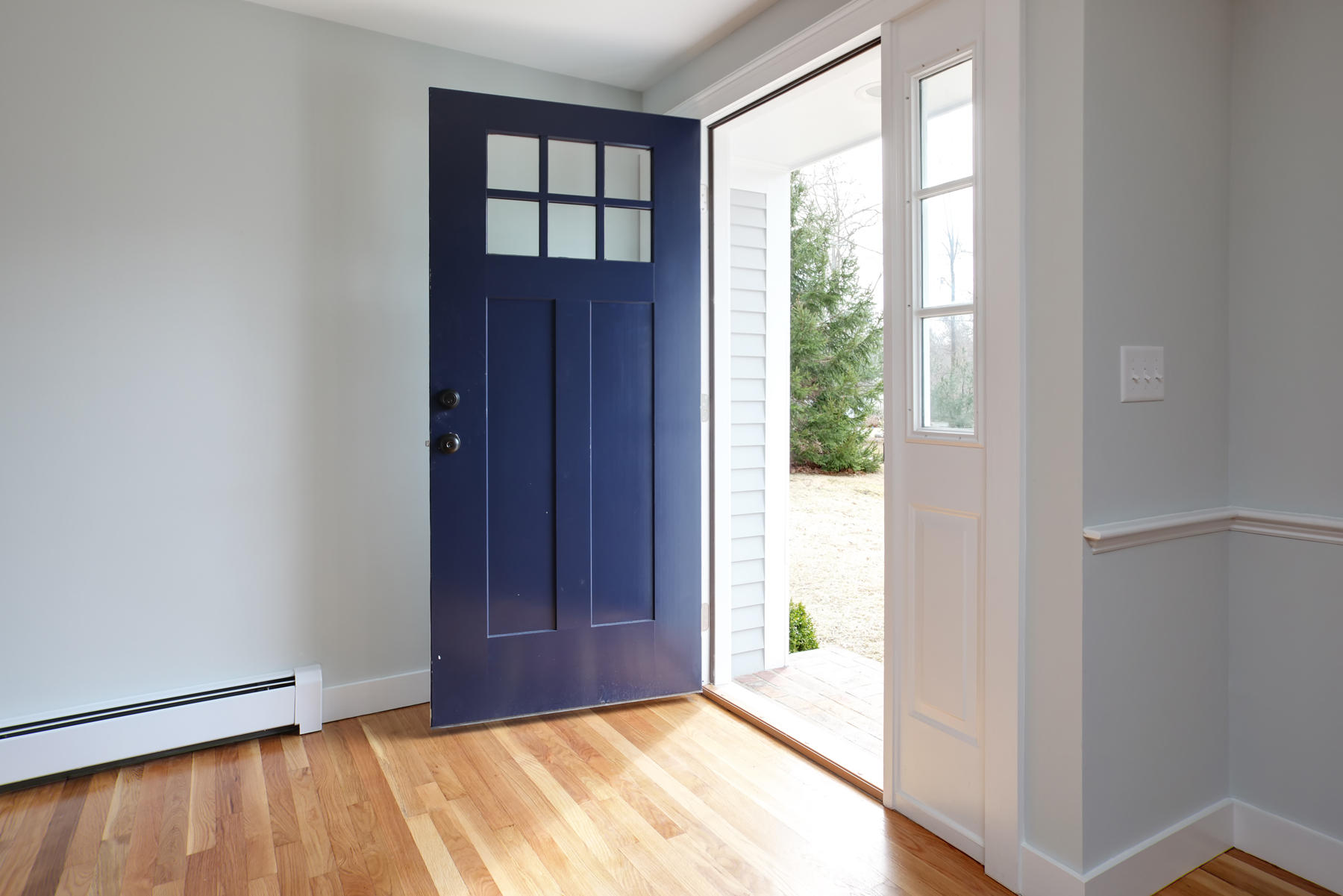45 Chipman Road Sandwich, MA 02563 - Photo 3 of 30 a view of an empty room with wooden floor and a window