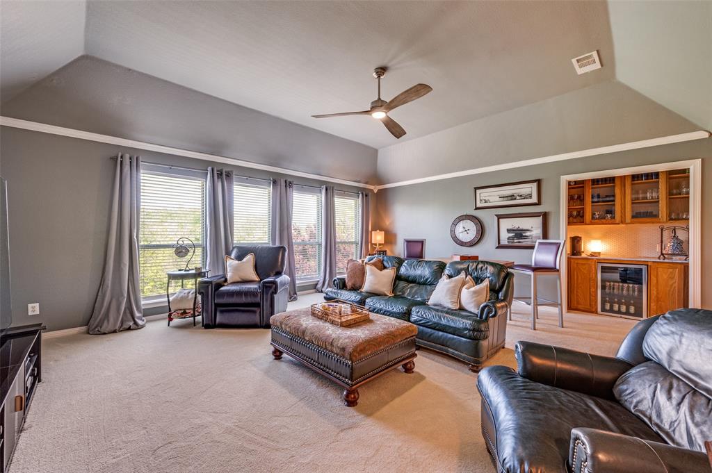2841 Winding Creek Road Prosper, TX 75078 - Photo 24 of 40 a living room with furniture and a large window