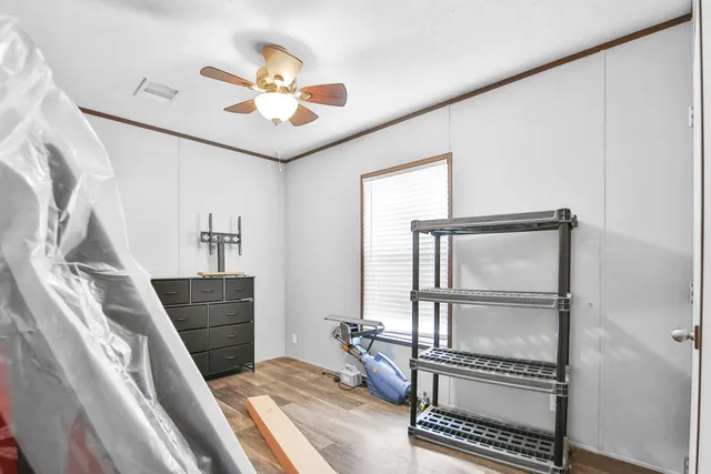 a very nice looking room with a piano and a rug