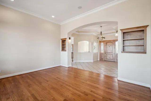 a view of a house with a snow in the yard