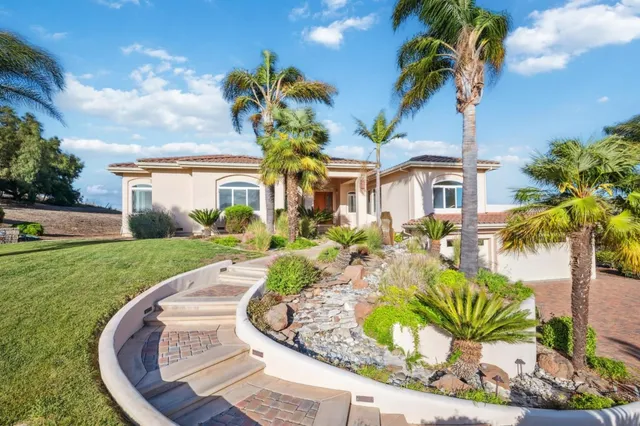 a house view with a garden space