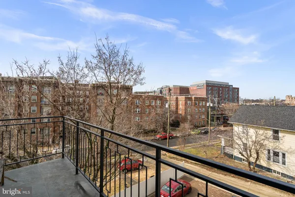 a view of a balcony with city view
