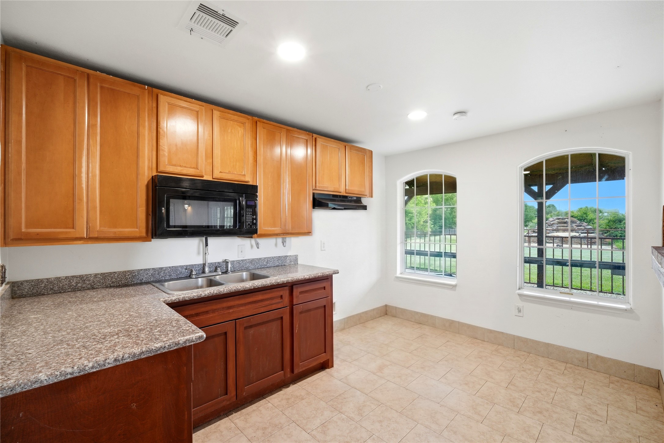 11741 Ezekiel Road Tomball, TX 77375 - Photo 17 of 30 a kitchen with lots of counter top space