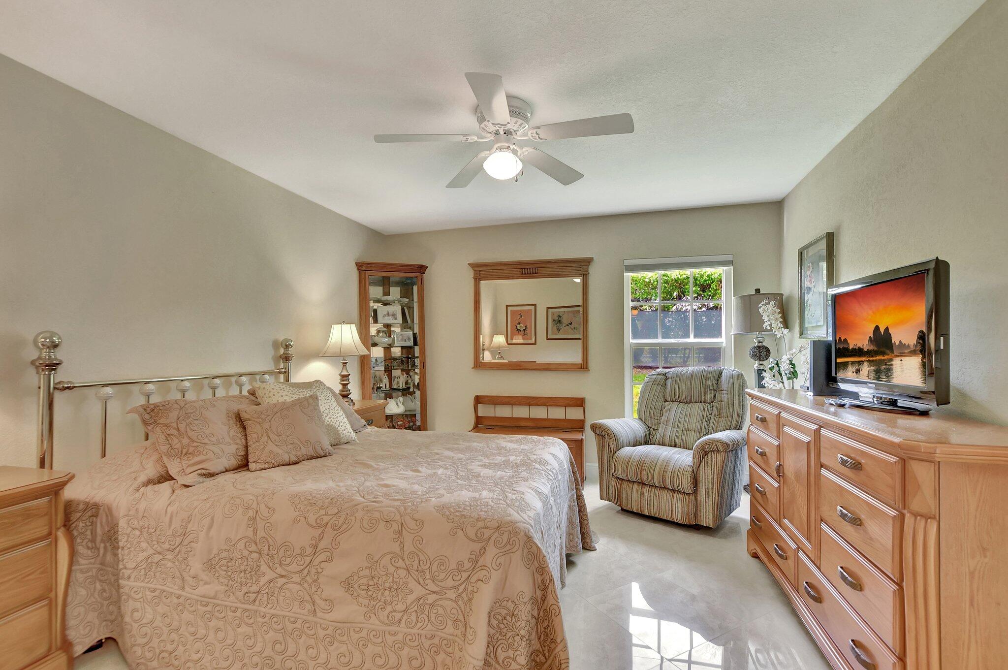 9070 Fairbanks Lane, Unit 4 Boca Raton, FL 33496 - Photo 17 of 39 PRIMARY BEDROOM