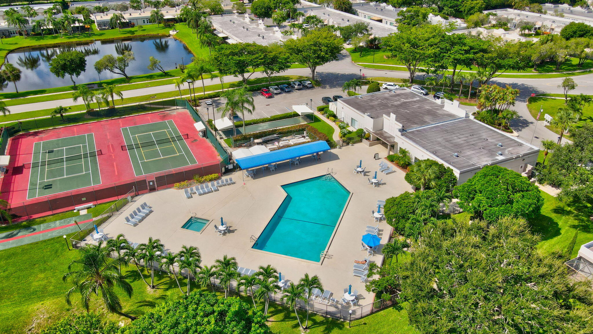 9070 Fairbanks Lane, Unit 4 Boca Raton, FL 33496 - Photo 28 of 39 COMMUNITY POOL AND COURTS