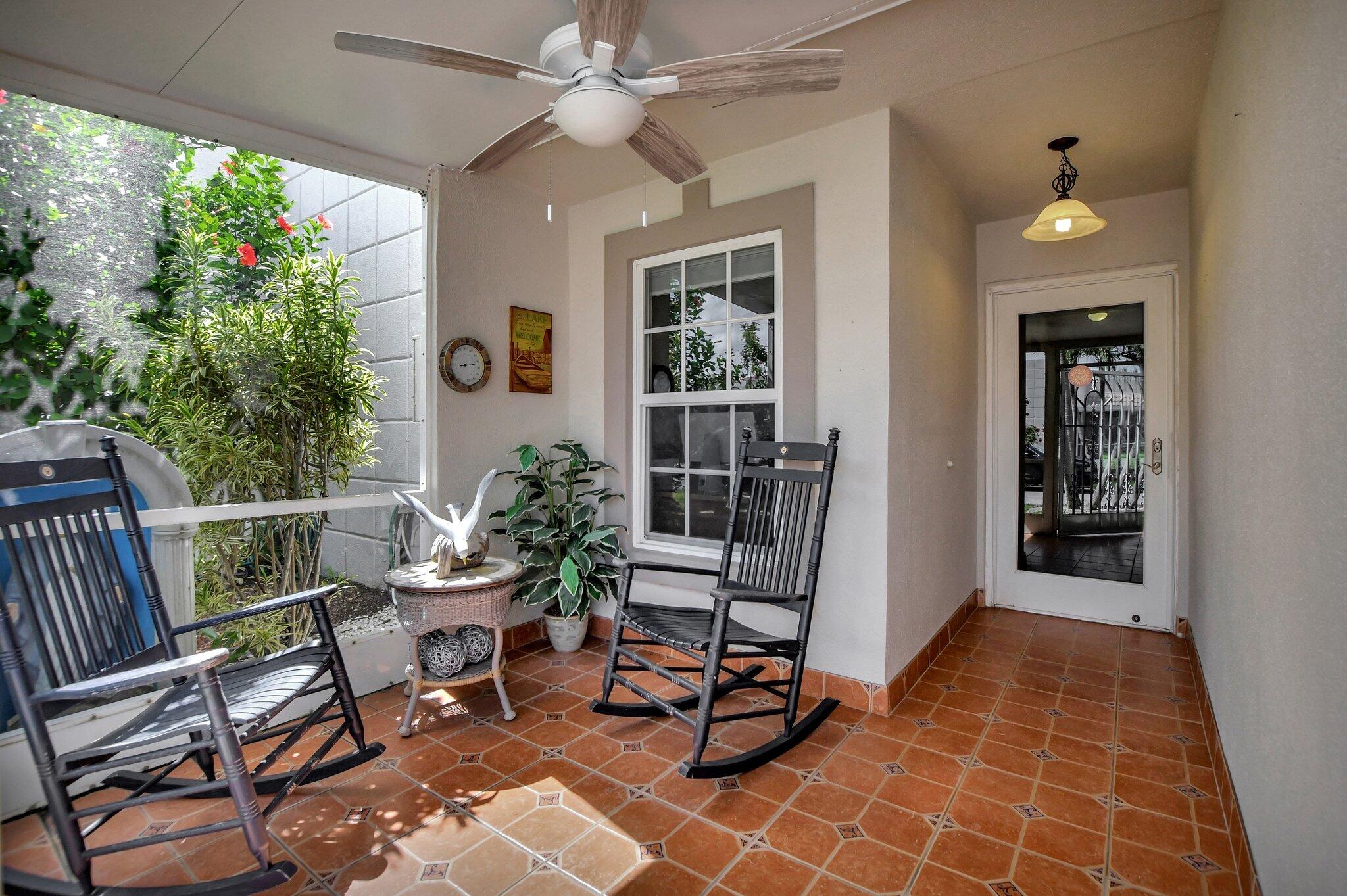 9070 Fairbanks Lane, Unit 4 Boca Raton, FL 33496 - Photo 4 of 39 SCREENED FRONT PORCH