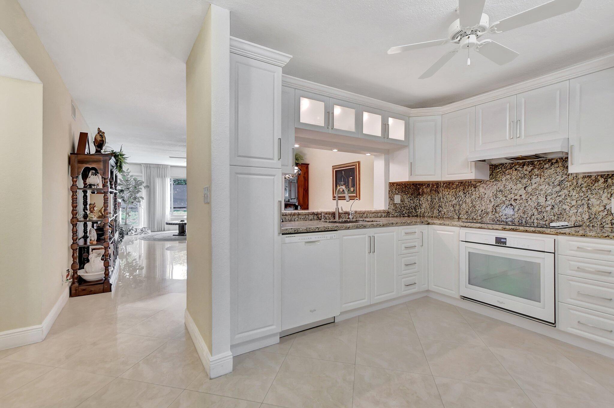 9070 Fairbanks Lane, Unit 4 Boca Raton, FL 33496 - Photo 6 of 39 RENOVATED KITCHEN