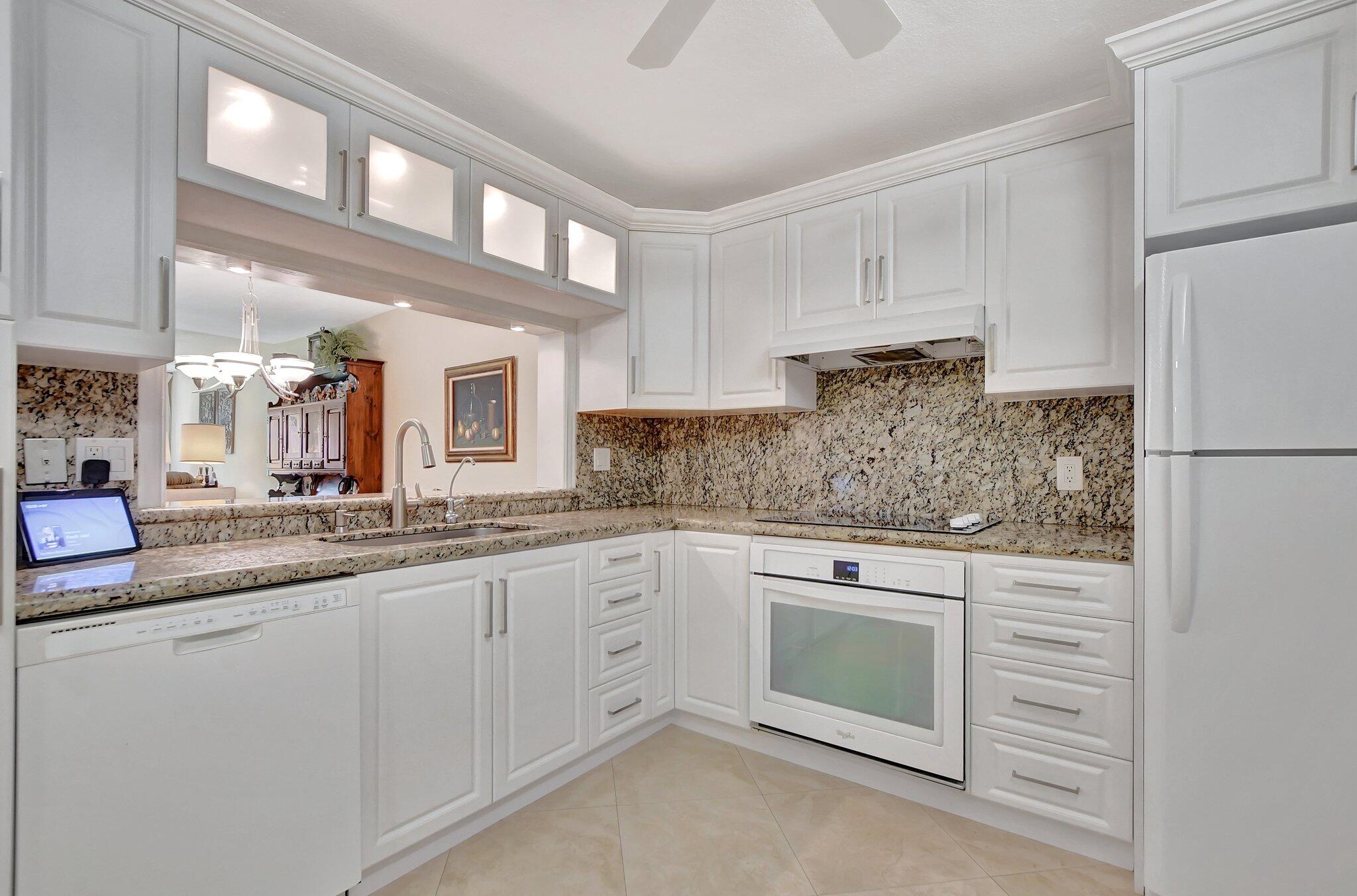 9070 Fairbanks Lane, Unit 4 Boca Raton, FL 33496 - Photo 7 of 39 KITCHEN VIEW