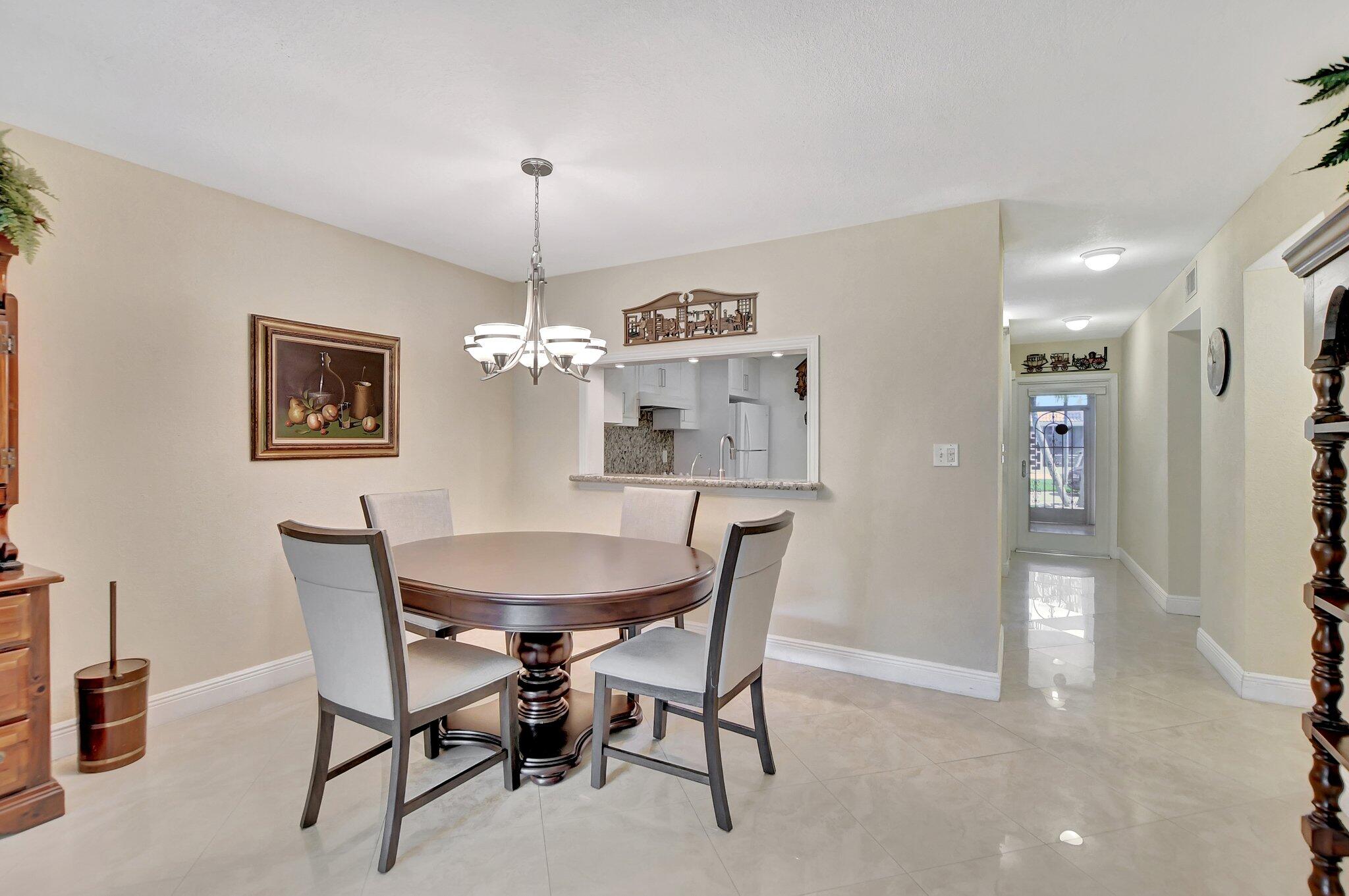 9070 Fairbanks Lane, Unit 4 Boca Raton, FL 33496 - Photo 10 of 39 DINING AREA